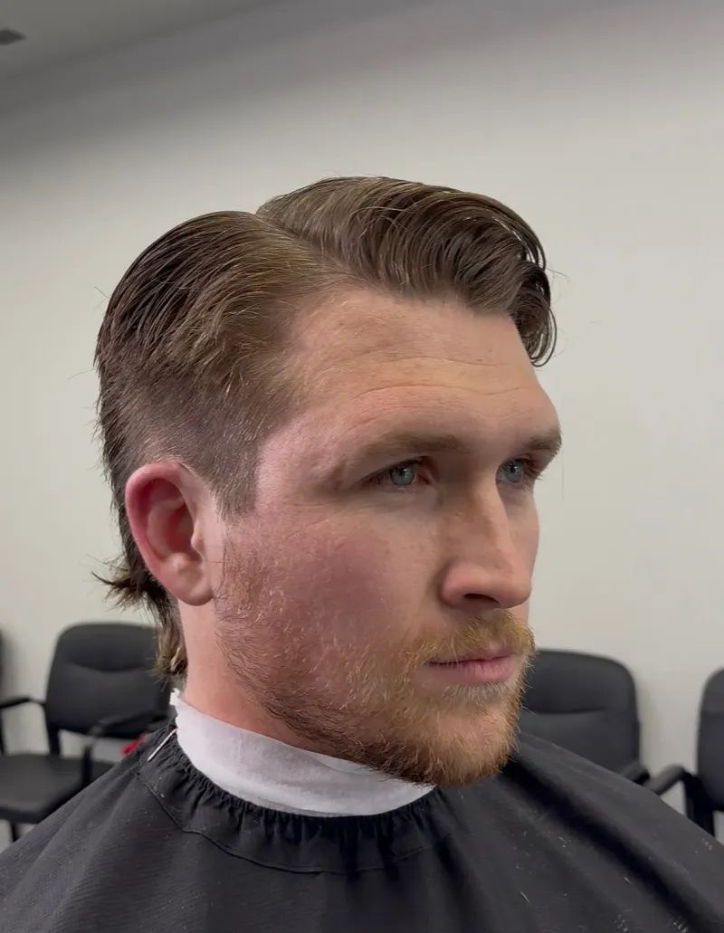 Same client after a refresh — cut, fade, and beard tidy.