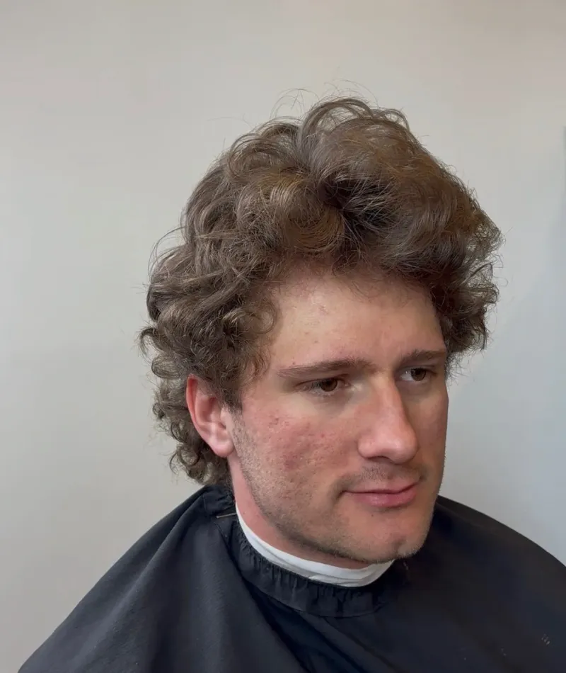Client before a haircut and beard cleanup.